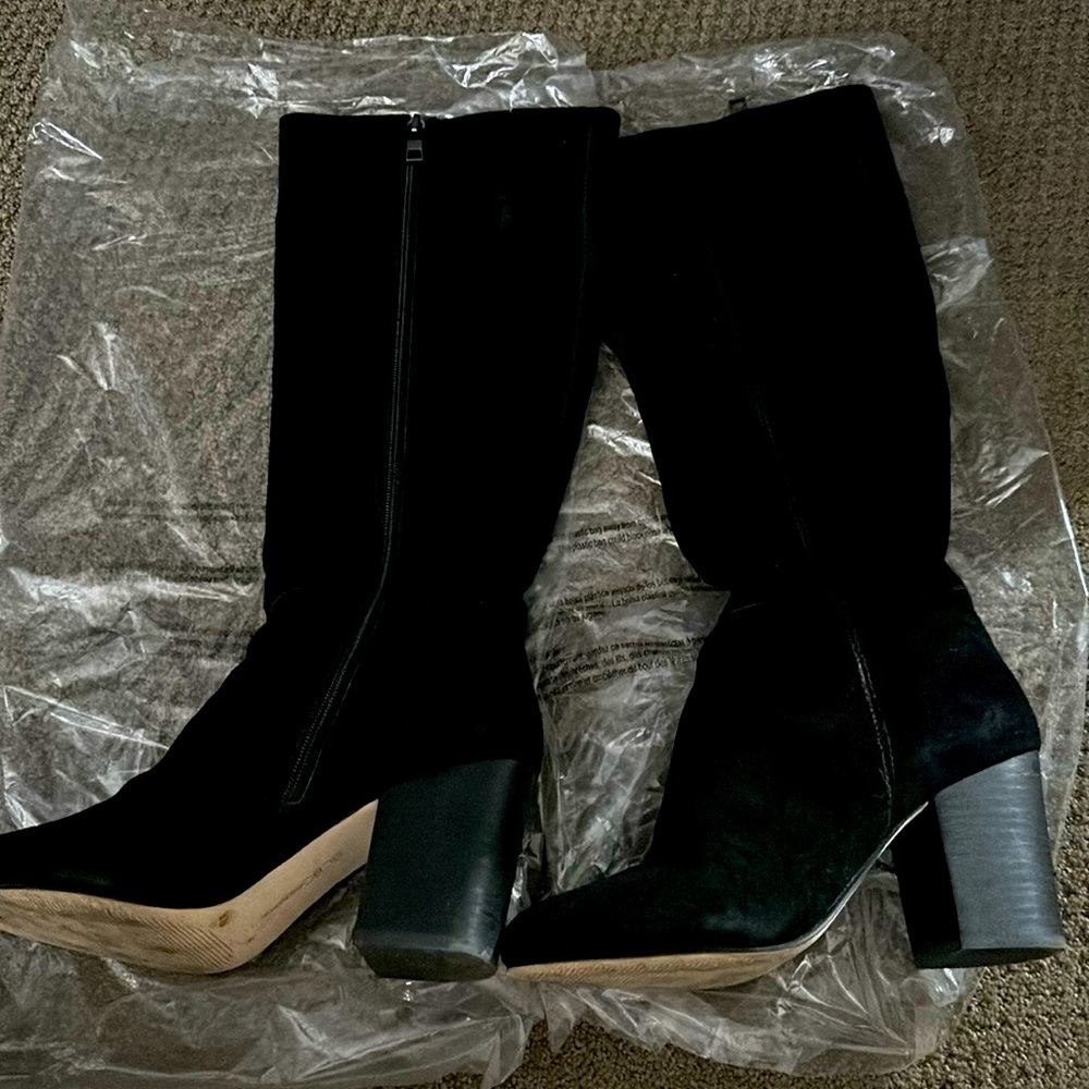 Tall black boots